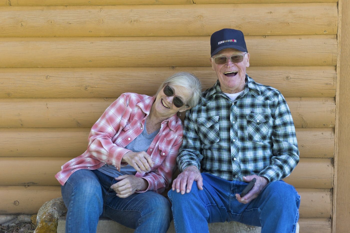 Retired couple relaxing together outdoors
